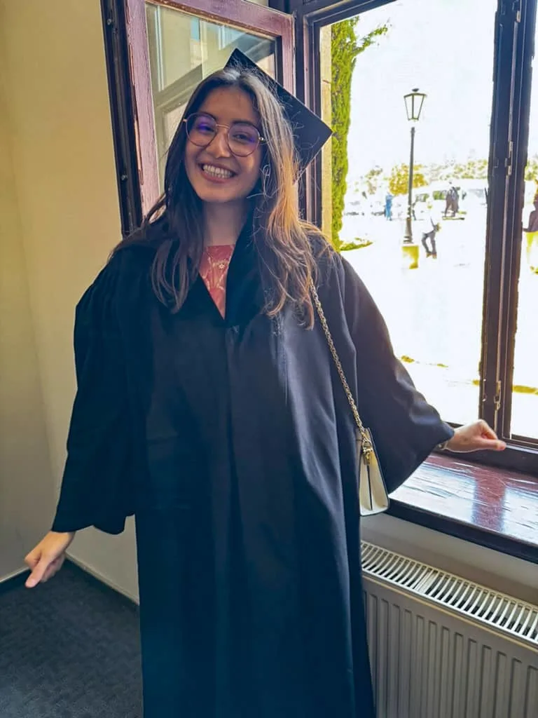 Dr. A in graduation attire